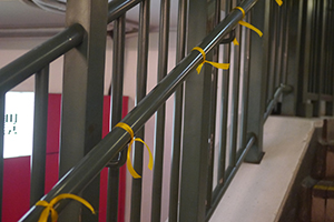 Yellow ribbons on a railing, Central, 1 October 2014