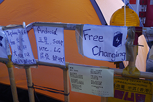 Signs at the Admiralty Umbrella Movement occupation site, Harcourt Road, 25 October 2014