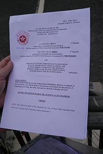 Notice placed by the High Court at the Mongkok Umbrella Movement occupation site, Nathan Road, 26 October 2014