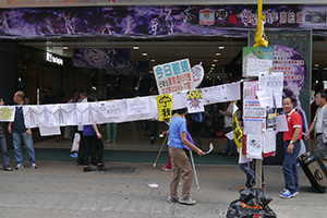 Posters at the Mongkok Umbrella Movement occupation site, Nathan Road, 26 October 2014