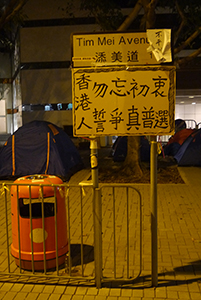 Poster on a road sign at the Admiralty Umbrella Movement occupation site, Tim Mei Avenue, 31 October 2014
