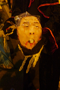 Image of Leung Chun-ying at the Admiralty Umbrella Movement occupation site, Harcourt Road, 31 October 2014