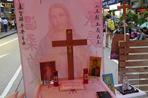 Crucifix and Christian religious images at the Mongkok Umbrella Movement occupation site, Nathan Road, 26 October 2014