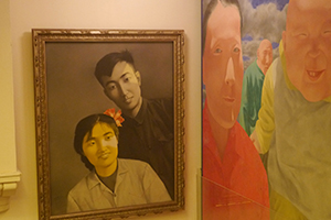 Artworks by Zhang Xiaogang (left) and Fang Lijun (right) at the China Club, Central, 3 October 2014