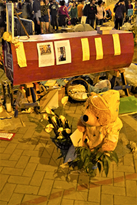 Coffin and stuffed toy at the Admiralty Umbrella Movement occupation site, Harcourt Road, 30 November 2014