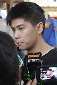 Student leader Lester Shum being interviewed at the Admiralty Umbrella Movement occupation site, Harcourt Road, 2 November 2014