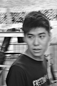 Student leader Lester Shum at the Admiralty Umbrella Movement occupation site, Harcourt Road, 2 November 2014