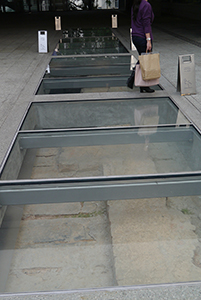 Archeological remains visible beneath a glass floor, PMQ, Central, 15 November 2014