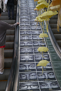 Paper umbrellas and posters at the Admiralty Umbrella Movement occupation site, Harcourt Road, 15 November 2014