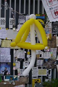 Balloon umbrella and posters at the Admiralty Umbrella Movement occupation site, Harcourt Road, 15 November 2014