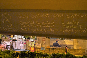 Graffiti at the Admiralty Umbrella Movement occupation site, Gloucester Road, 19 November 2014