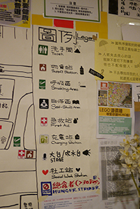 Map and posters at Admiralty Centre, Admiralty, 19 November 2014