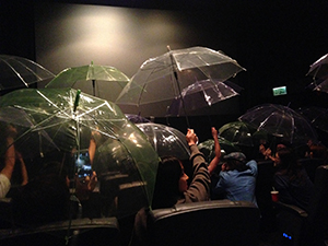 Audience holding up umbrellas in a cinema, Broadway Cinema, Metroplaza, Kwai Chung, Kowloon, 12 November 2014