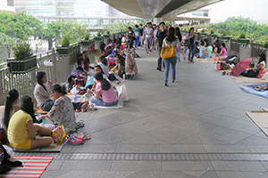 Domestic helpers gathering on a footbridge, Central, 2 November 2014