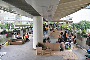 Domestic helpers gathering on a footbridge, Central, 2 November 2014