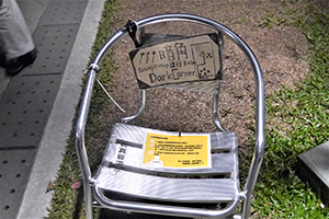 Posters on a chair, Admiralty Umbrella Movement occupation site, 10 December 2014