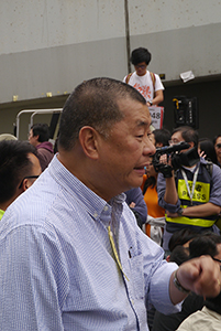 Entrepreneur Jimmy Lai at the Admiralty Umbrella Movement occupation site on its last day, Harcourt Road, 11 December 2014