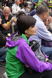 Audrey Eu, participating in a sit-in on the final day of the Admiralty Umbrella Movement occupation site, 11 December 2014