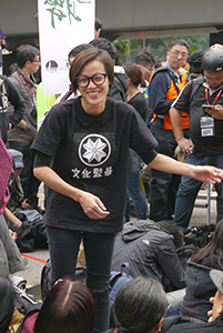 Pop singer Denise Ho, participating in a sit-in on the final day of the Admiralty Umbrella Movement occupation site, 11 December 2014