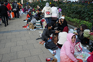 Indonesian domestic helpers enjoying their day off near Victoria Park, Causeway Bay, 14 December 2014