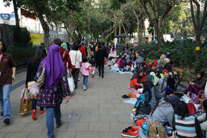 Indonesian domestic helpers enjoying their day off near Victoria Park, Causeway Bay, 14 December 2014