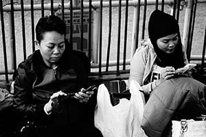 Indonesian domestic helpers enjoying their day off near Victoria Park, Causeway Bay, 14 December 2014