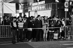 People waiting to cross the street, Queen's Road Central, 31 December 2014