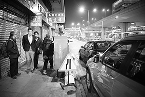 Street scene at night, Connaught Road West, Sheung Wan, 16 December 2014