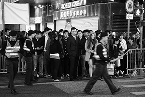 People waiting to cross the street, Queen's Road Central, 31 December 2014