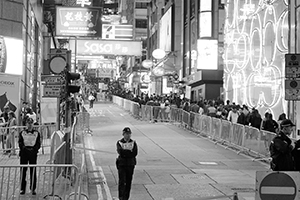 Crowd walking into Lan Kwai Fong, Central, 31 December 2014