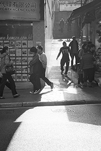 Street scene, Queen's Road Central, Sheung Wan, 1 January 2015