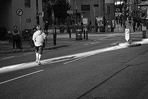 A man crossing the road, Morrison Street, Sheung Wan, 1 January 2015