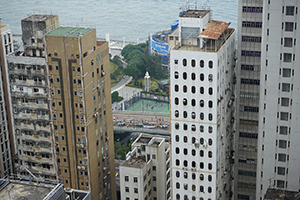 Runners in the Hong Kong Marathon seen on an elevated roadway, Sheung Wan, 25 January 2015