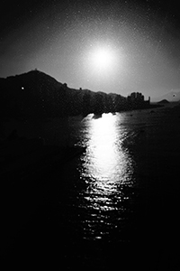 Sun over Victoria Harbour, viewed from Tsim Sha Tsui, 14 January 2015