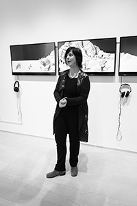 Curator Valerie Doran at the opening of 'Grids and Stones: Landscape as Cultural Self-portrait', Hanart TZ Gallery, Pedder Building, Pedder Street, Central, 28 January 2015