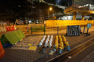 Protest display with hard hats, outside the Central Government Offices Complex, Tim Mei Avenue, Admiralty, 25 February 2015