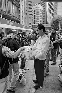 Martin Lee facilitating fundraising for the Civil Human Rights Front in the pro-democracy march from Victoria Park to Central, Des Voeux Road Central, 1 February 2015