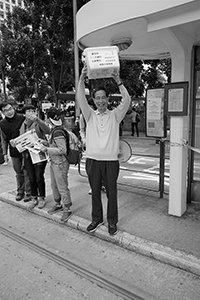 Martin Lee facilitating fundraising for Civil Human Rights Front in the pro-democracy march from Victoria Park to Central, Des Voeux Road Central, 1 February 2015