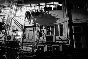 Residential building with laundry on a rack, Sheung Wan, 3 February 2015
