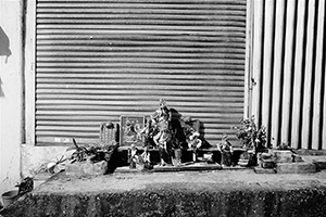 Figurines outside a closed store, Tai Ping Shan, 3 February 2015