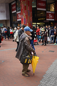 Protester with umbrella, outside Sogo, Causeway Bay, 1 February 2015