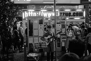 Street performance at night, East Point Road, Causeway Bay, 18 February 2015