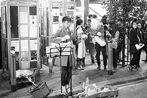 Street performance at night, East Point Road, Causeway Bay, 18 February 2015