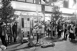 Street performance at night, East Point Road, Causeway Bay, 18 February 2015