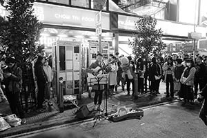 Street performance at night, East Point Road, Causeway Bay, 18 February 2015