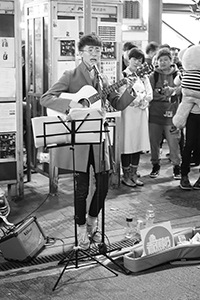 Street performance at night, East Point Road, Causeway Bay, 18 February 2015