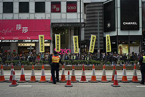 Policemen on crowd control duty during the pro-democracy march from Victoria Park to Central, Hennessy Road, 1 February 2015