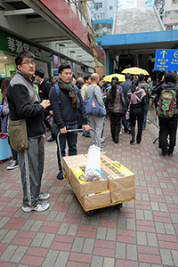 Labour Party workers transporting posters in the pro-democracy march from Victoria Park to Central, Percival Street, 1 February 2015