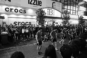 Young people performing on the street in front of Island Beverley Shopping Centre on Lunar New Year Eve, East Point Road, Causeway Bay, 18 February 2015