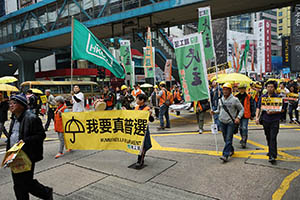Hong Kong Confederation of Trade Unions banners at a pro-democracy march from Victoria Park to Central, Hennessy Road, 1 February 2015